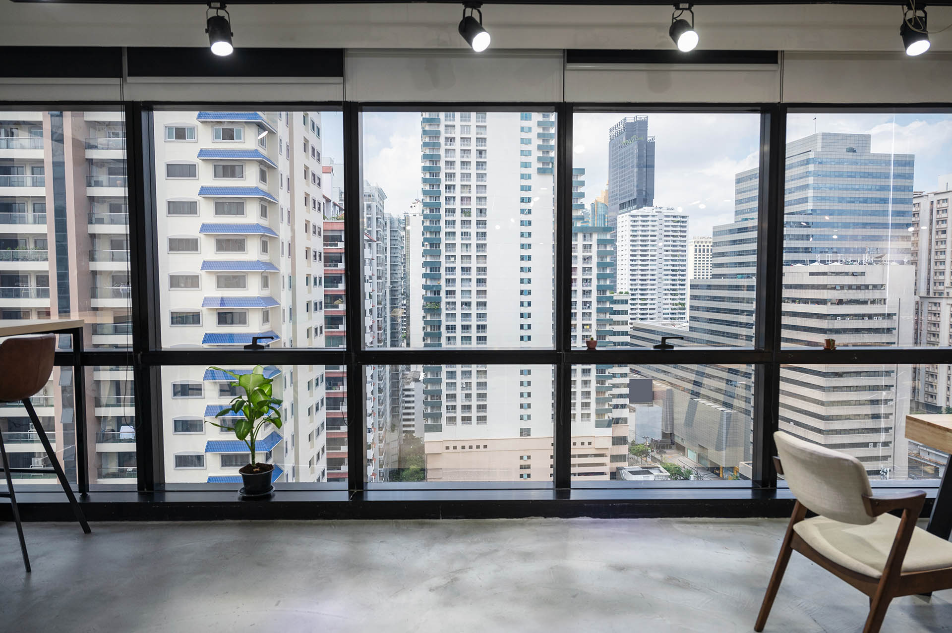 Cityscape of business office in downtown from empty coworking sp
