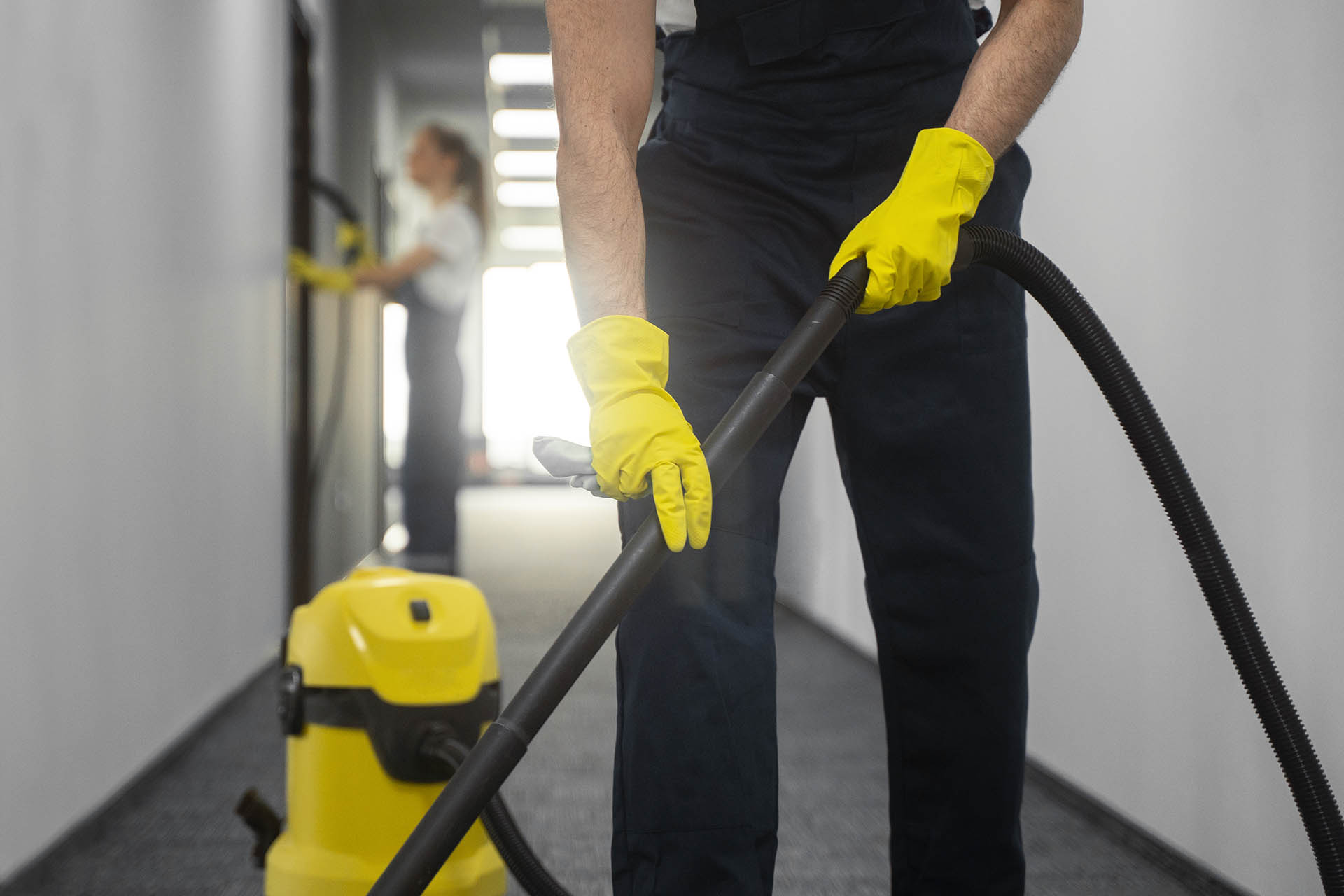 front-view-man-cleaning-indoors