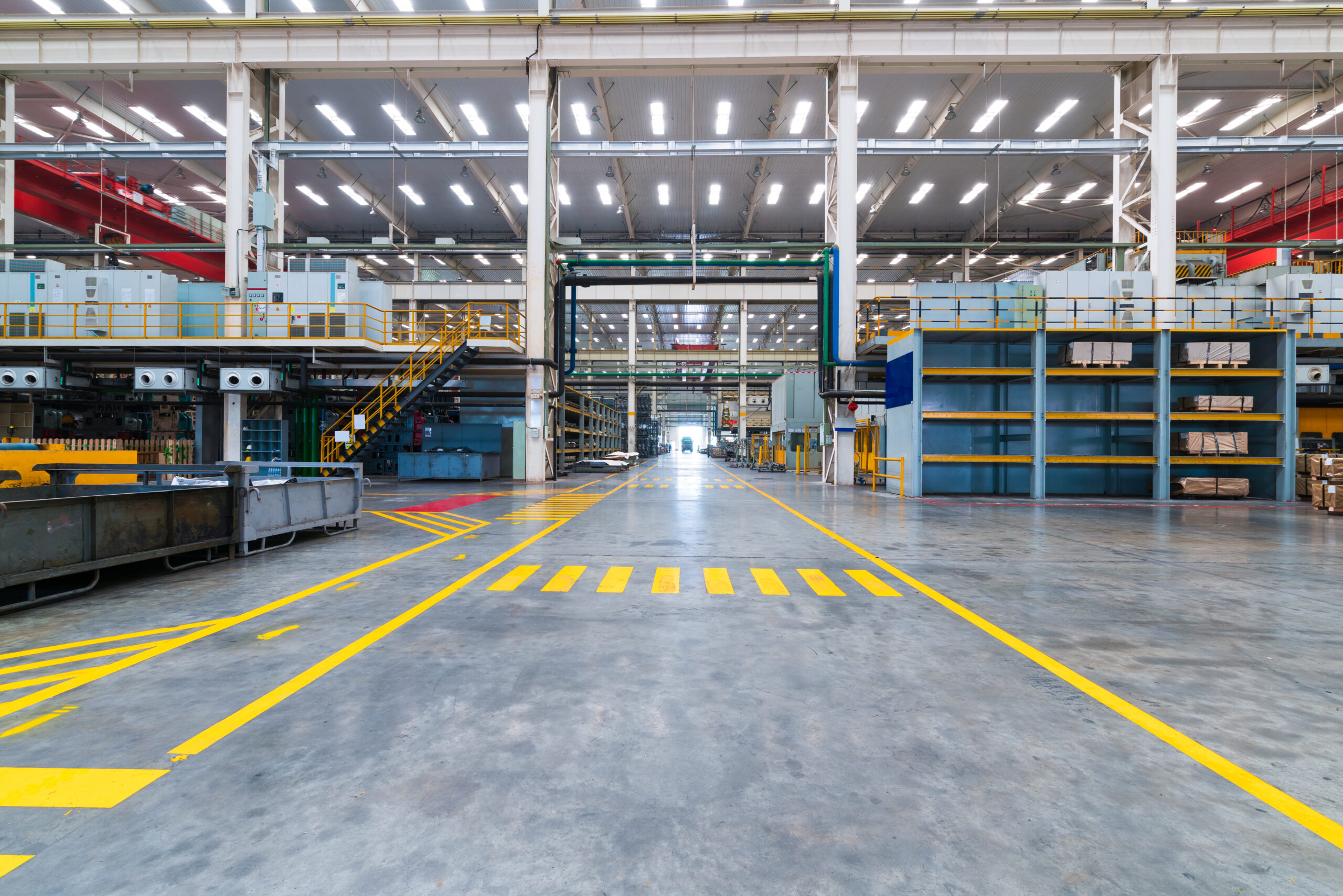 Empty workshop with a lift in a car repair station
