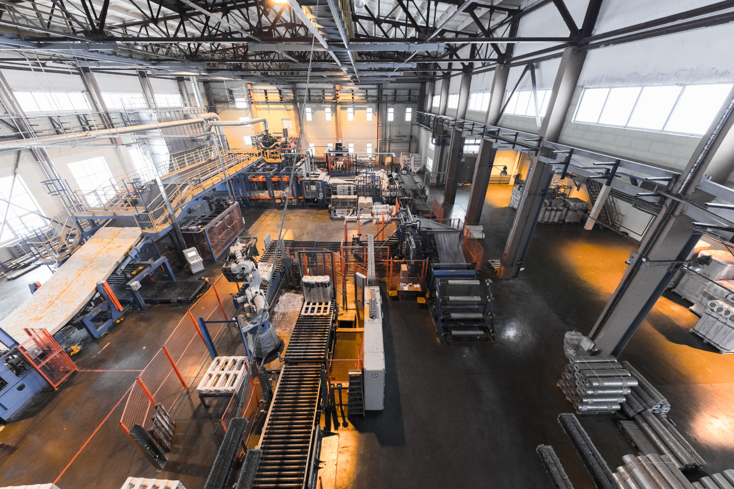 Fiberglass production industry equipment at manufacture background